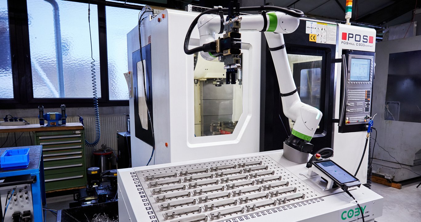Coby at a POS CNC machine