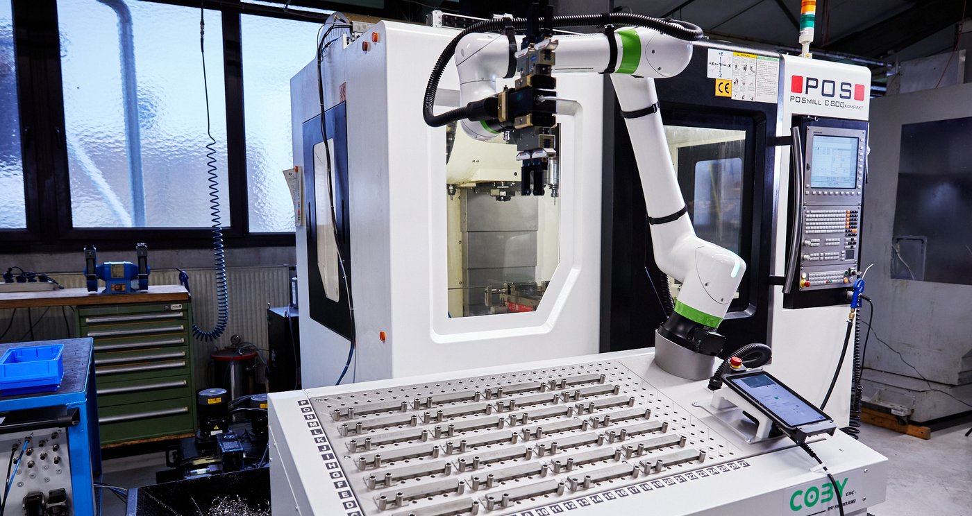 Coby at a POS CNC machine