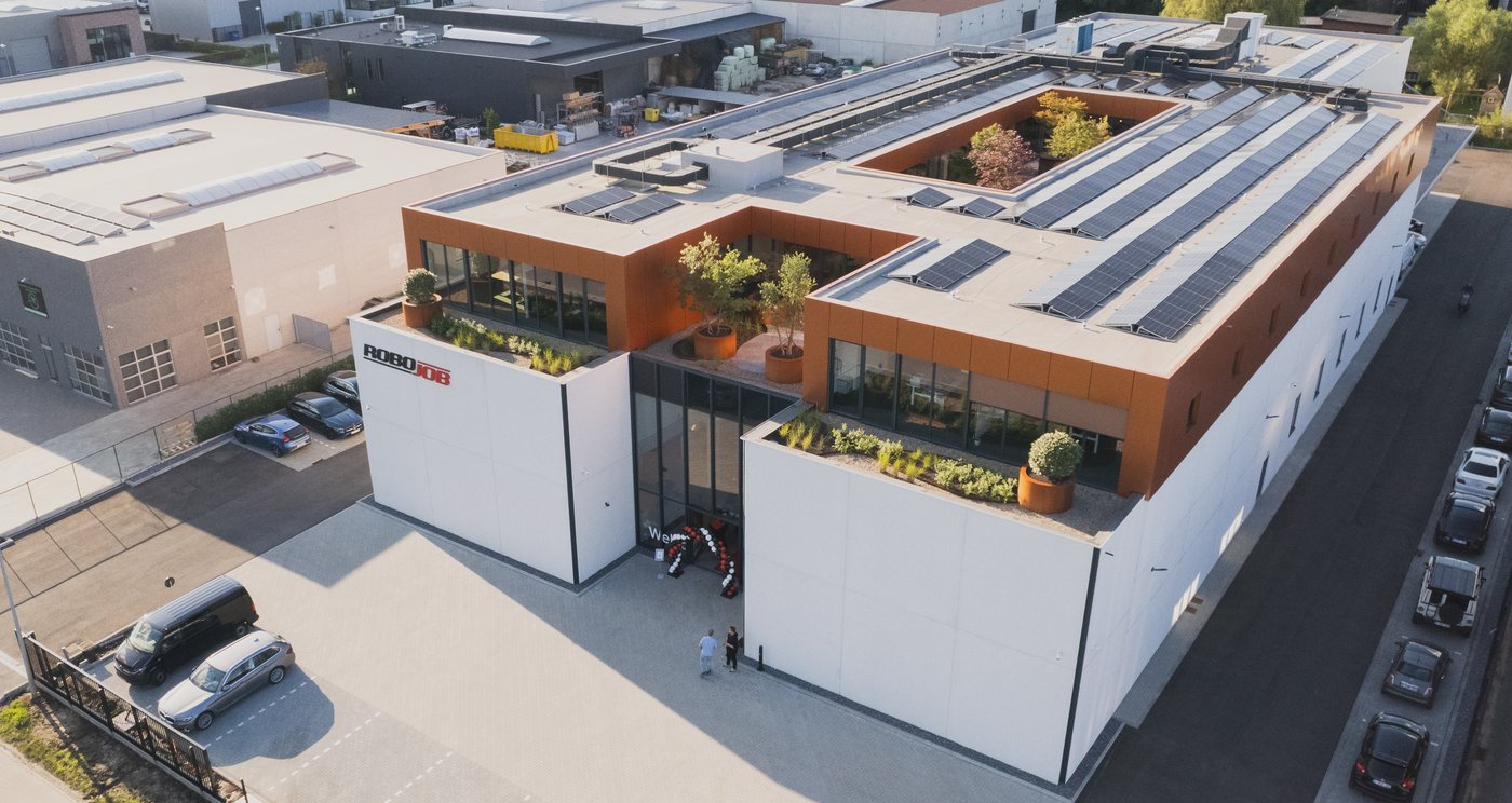 drone shot of the robojob nv headquarters in heist-op-den-berg