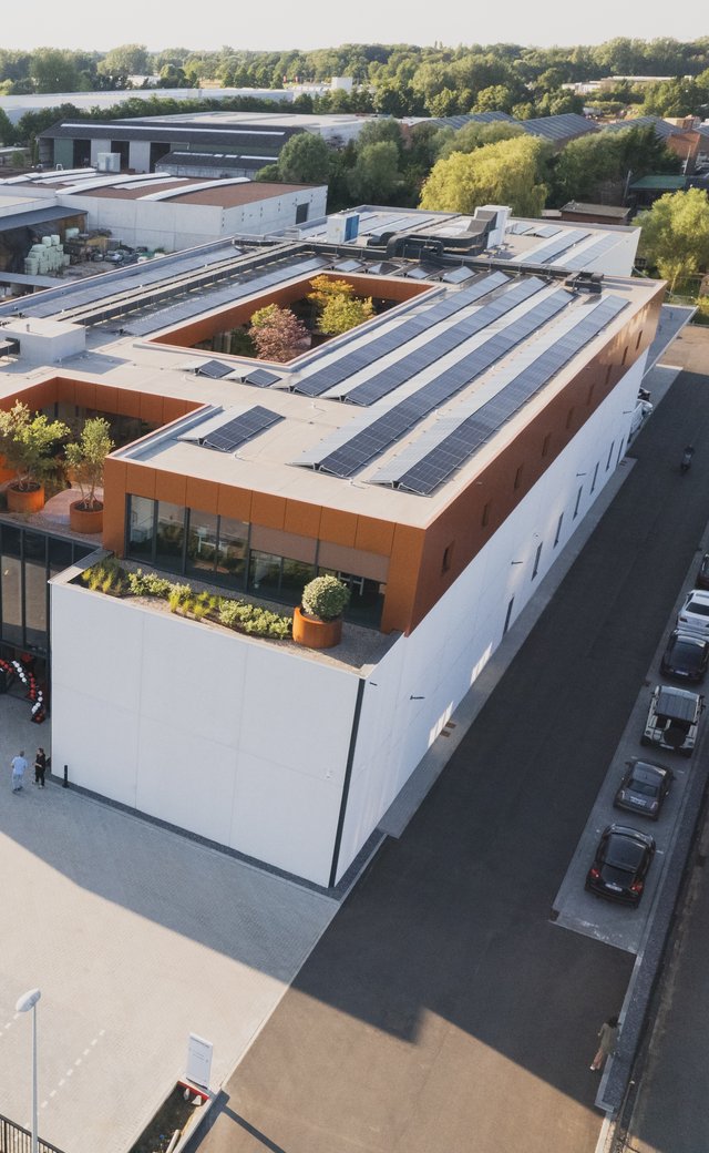 drone shot of the robojob nv headquarters in heist-op-den-berg