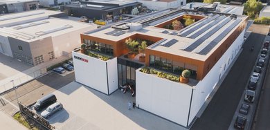 drone shot of the robojob nv headquarters in heist-op-den-berg