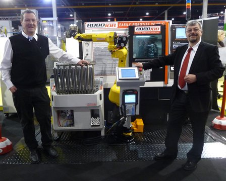Que faisait une petite entreprise belge d'automatisation CNC sur le stand de Fanuc au TechniShow en 2012 ?